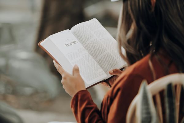 A girl reading the Bible